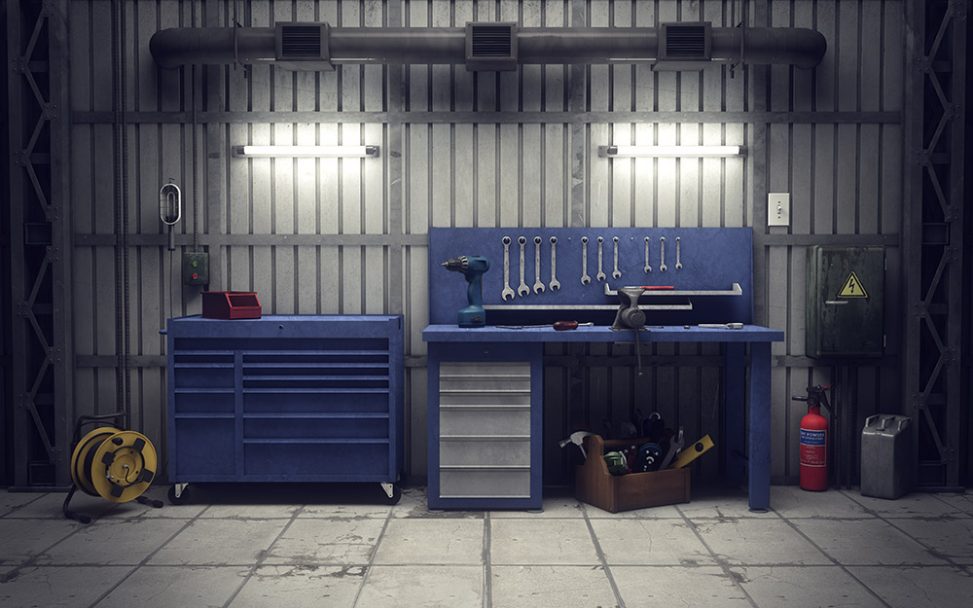 Two different types of blue workbench in a garage